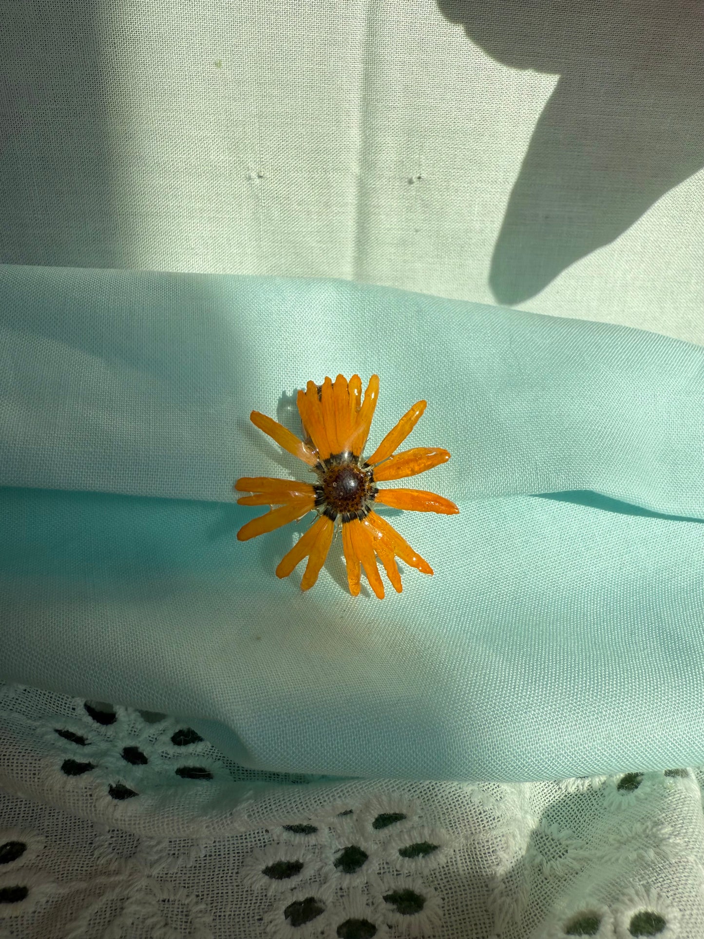 Orange wildflower pin